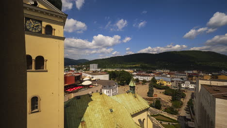 Panorama-Motion-Time-Lapse-of-Žilina-City,-Slovakia-viewed-from-Burian's-Tower-on-summer-sunny-day