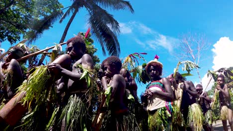 A-live-bamboo-band-sing-sing-tribal-performance-at-cultural-show-festival-on-Bougainville-Island,-Papua-New-Guinea