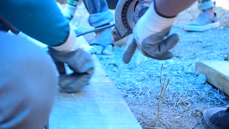 A-student-cutting-a-wooden-block-using-a-cutter-during-a-workshop-conducted-at-an-architecture-college-in-Kerala