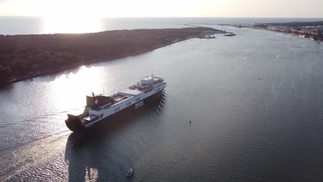 Majestic-DFDS-ferry-ship-leaving-Klaipeda-harbor-towards-sunset