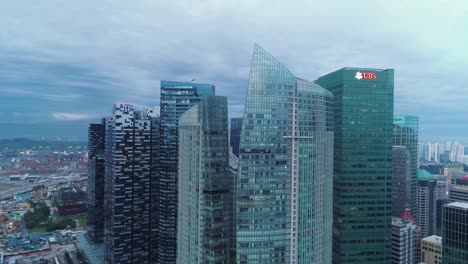 Aerial-of-skyscrapers-in-Singapore-central-area-skyline-on-cloudy-day