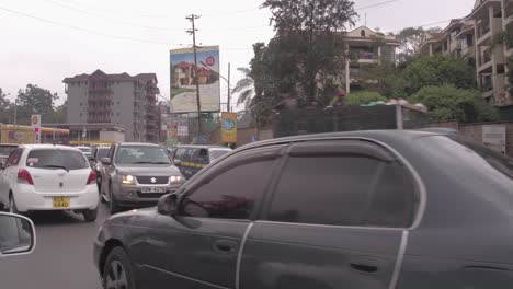 Driving-in-traffic-in-Kileleshwa,-Nairobi,-Kenya