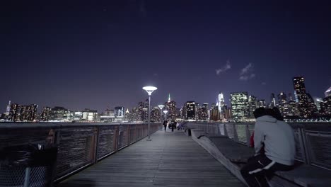 walking-POV-shot-of-Long-Island-walkway-with-a-couple-coming-towards