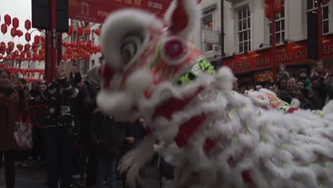 chinese-dragon-dancer-during-performance-celebration-new-years-in-china-town-london-2020-before-coronavirus-outbreak-lockdown