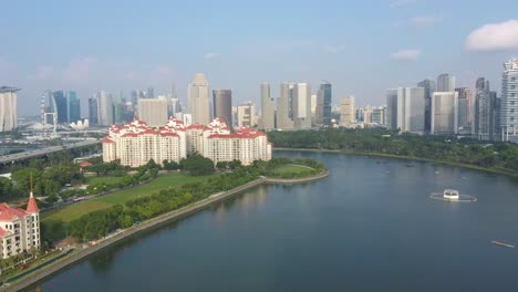 Aerial-drone-shot-of-Costa-Rhu-with-Singapore-skyline-backdrop