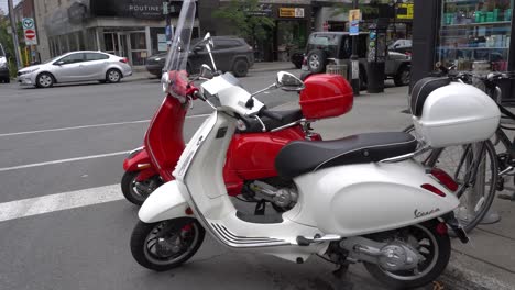 Two-beautiful-Vespa-on-a-busy-street