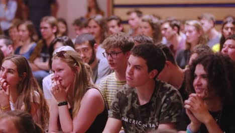 Happy-Young-Audience-Clapping-In-A-Youth-Conference-At-Waldorf-School-In-Zeist,-Netherlands---panning-shot