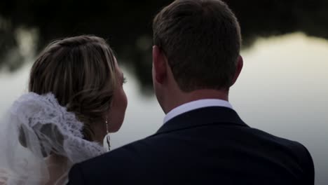 This-lovely-couple-has-just-been-married-and-now-enjoys-each-other's-company-whilst-sitting-on-the-river-bank-watching-the-sun-set