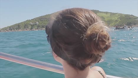 Girl-looking-at-a-desert-island-in-the-brazilian-coast