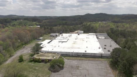 Aerial-Drone-Footage-Pulling-Away-From-an-Abandoned-National-Standard-Factory