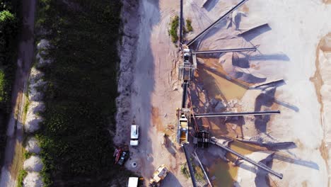 Aerial-shot-from-a-drone-of-quarry-and-heavy-machinery-in-pomeranian-district-in-Poland