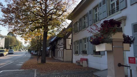 Handheld-shot-of-the-community-center-in-Bottmingen,-a-small-town-in-Switzerland