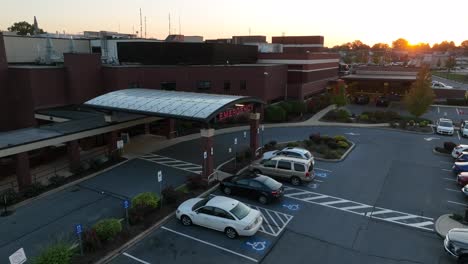 Aerial-shot-of-emergency-room-at-hospital-at-sunrise