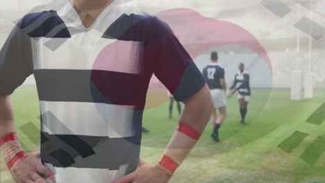 Animación-De-La-Bandera-De-Corea-Del-Sur-Sobre-Diversos-Jugadores-De-Rugby-En-El-Campo.