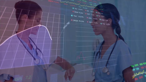 Animation-of-data-processing-and-diagrams-over-diverse-female-doctors-talking-in-hospital