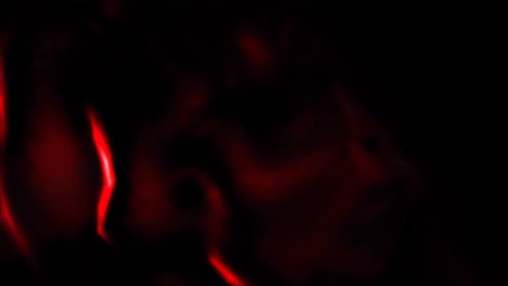 Animation-of-glowing-red-trails-of-light-moving-on-black-background