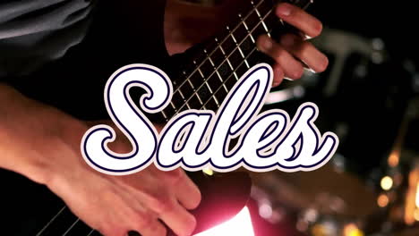 Animation-of-sales-text-over-caucasian-man-playing-guitar