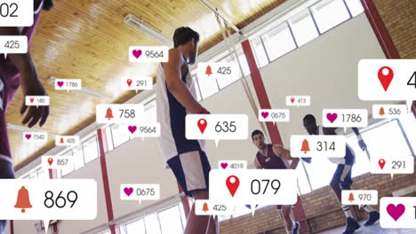 Animation-of-social-media-notifications-over-diverse-male-basketball-teams-playing-game-indoors