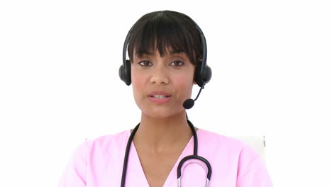 Young-nurse-using-headset-
