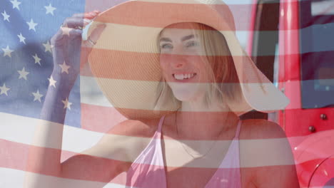 Animation-of-flag-of-usa-over-caucasian-woman-by-beach