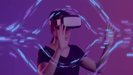 Animation-of-purple-shapes-moving-over-caucasian-woman-using-vr-headset