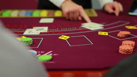 Dealer-dealing-poker-cards