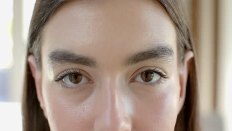 Close-up-of-a-teenage-Caucasian-girl-with-brown-eyes-and-prominent-eyebrows