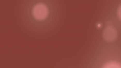 Animation-of-light-spots-on-red-background