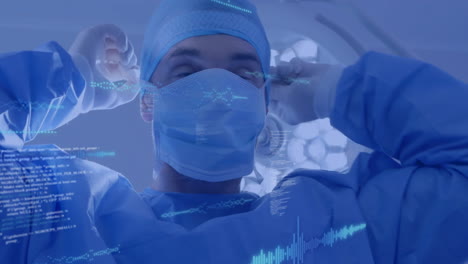 Animation-of-data-processing-and-diagrams-over-caucasian-male-surgeon-wearing-face-mask