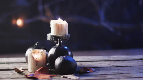 Candles-provide-a-warm-glow-on-a-rustic-wooden-surface
