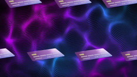 Animation-of-credit-cards-over-purple-and-blue-shapes-on-black-background