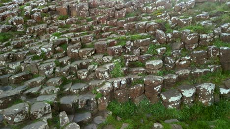 Aerial-shot-of-the-basalt-stones-at-Giant's-Causeway,-County-Antrim,-in-Northern-Ireland