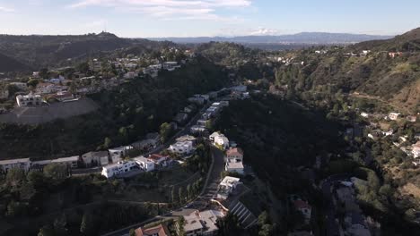 Prime-real-estate-home-in-the-Hollywood-Hills,-California-neighborhood---aerial-flyover