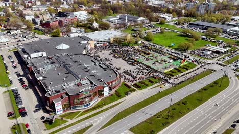 Aerial-Drone-cityscape-of-Riga-Latvia-at-Motorcycle-Season-Opening-urban-park