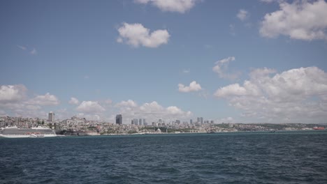 Ships,-ferries,-boats,-historical-buildings-in-the-Bosphorus,-Istanbul,-Turkiye