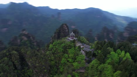 Aerial-speed-ramp-orbit-around-Liuqi-Pavilion-in-Huangshi-Village