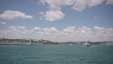 Ships,-ferries,-boats,-historical-buildings-in-the-Bosphorus,-Istanbul,-Turkiye