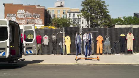 Sidewalk-Sale-Of-Clothes-On-A-Fence-In-Williamsburg-Brooklyn