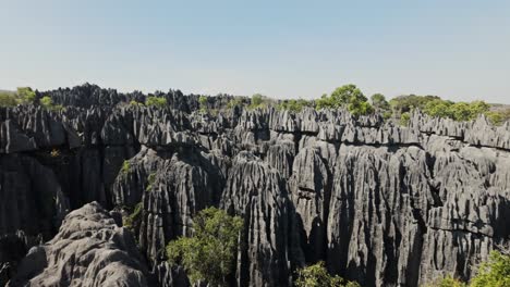Panoramic-view-of-grey-karst-limestone-cliffs-with-steep-furrowed-slopes