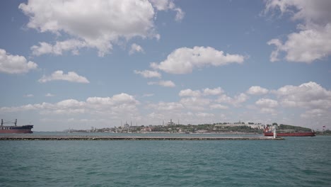 Ships,-ferries,-boats,-historical-buildings-in-the-Bosphorus,-Istanbul,-Turkiye