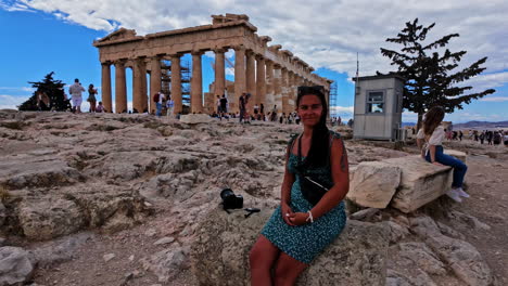Attractive-young-woman-posing-at-the-Parthenon-at-the-Athenian-Acropolis
