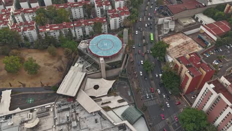 Hyperlapse-aerial-of-southern-area-of-Mexico-City,-heliport-in-middle-of-residential-areas