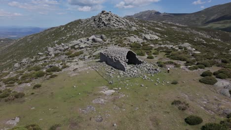 descent-flight-with-a-drone-and-with-a-pan-of-the-camera-taking-the-hermitage-of-San-Pedro-as-a-point-of-interest-we-see-that-there-is-a-perimeter-fence-we-see-its-state-in-ruins-and-its-domed-shape