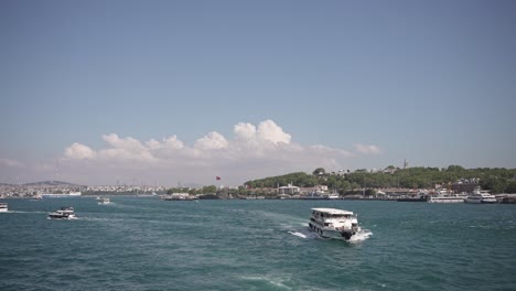 Ships,-ferries,-boats,-historical-buildings-in-the-Bosphorus,-Istanbul,-Turkiye