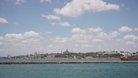 Ships,-ferries,-boats,-historical-buildings-in-the-Bosphorus,-Istanbul,-Turkiye