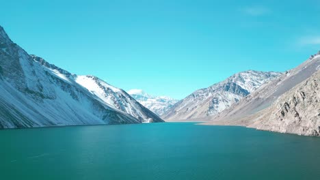 artificial-water-reserve-The-El-Yeso-reservoir,-Cajon-del-Maipo,-country-of-Chile