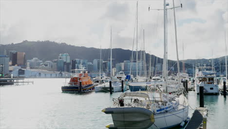 Crash-zoom-out-of-Wellington-Harbour,-New-Zealand