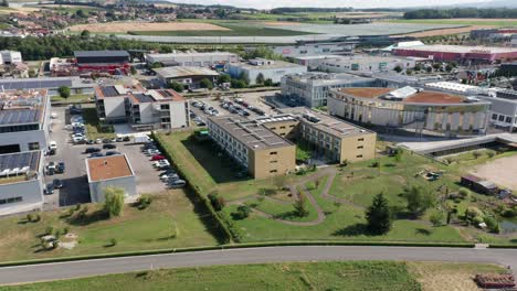 Jib-up-of-a-large-elderly-care-center-surrounded-by-industrial-buildings