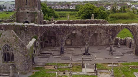 Claregalway-Friary-complete-overview-of-exterior-grounds-orbiting-around-stone-structure