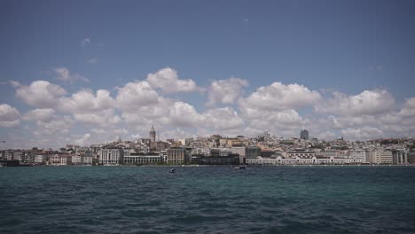 Ships,-ferries,-boats,-historical-buildings-in-the-Bosphorus,-Istanbul,-Turkiye